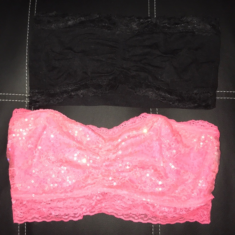 black lacy bra and lacy bright pink bra